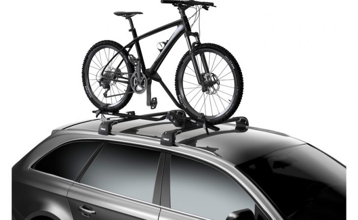 Thule Rooftop Bike Rack installed on a car carrying one bike