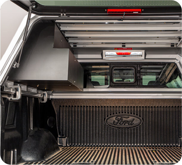 Interior of Ford truck bed with RSI SmartCap with drawer bin. 
