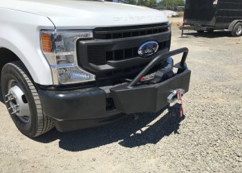 front tow hitch attached to ford truck