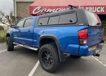 A.R.E. truck cap installed on toyota tacoma truck bed