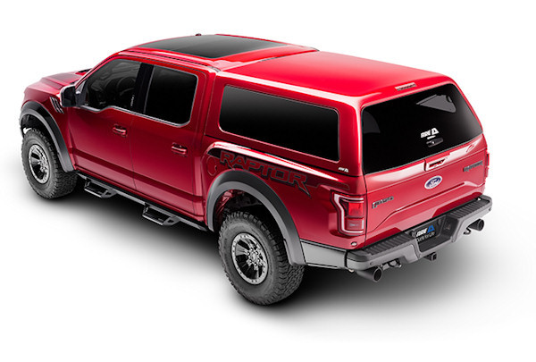 red pick-up truck with match CX revo truck cap